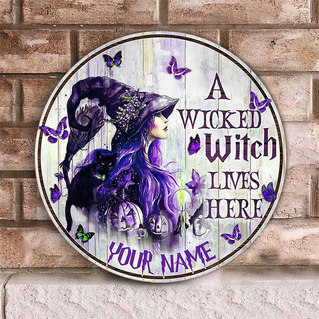 A Wicked Witch Lives Here Personalized Round Wood Sign