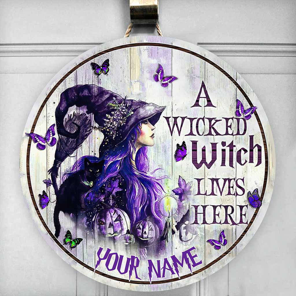 A Wicked Witch Lives Here Personalized Round Wood Sign